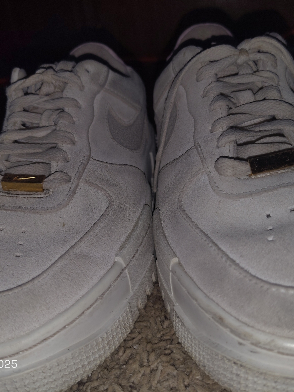 Nike Women’s White Suede Sneakers